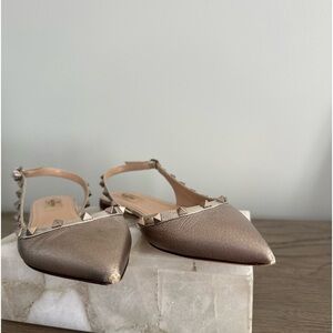 Beautiful Valentino metallic slides.  Good condition.  Super comfy.